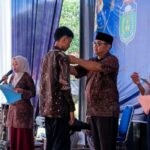 SMPN 18 Tebo Lepas 50 Siswa Kelas lX Dengan Penuh Khidmat Dan Meriah 100290763